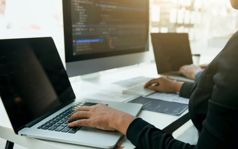 professional-development-programmer-cooperating-meeting-programming-website-1.webp