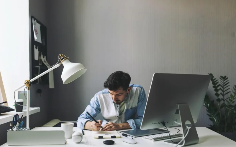 young-graphic-designer-working-in-office-1.webp